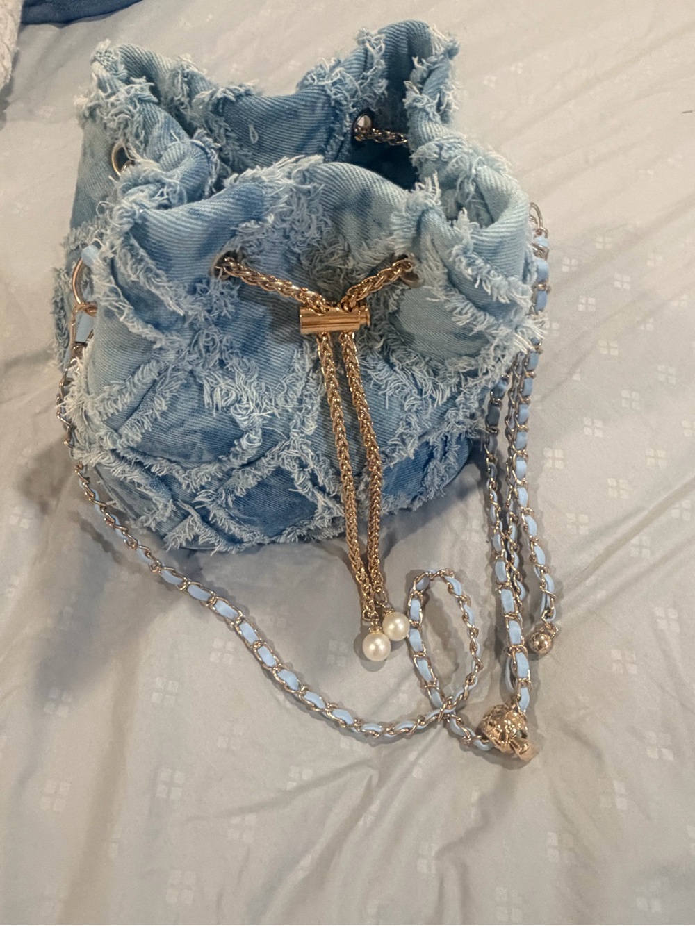 Light Blue Distressed Denim Bucket Bag with Gold Chain